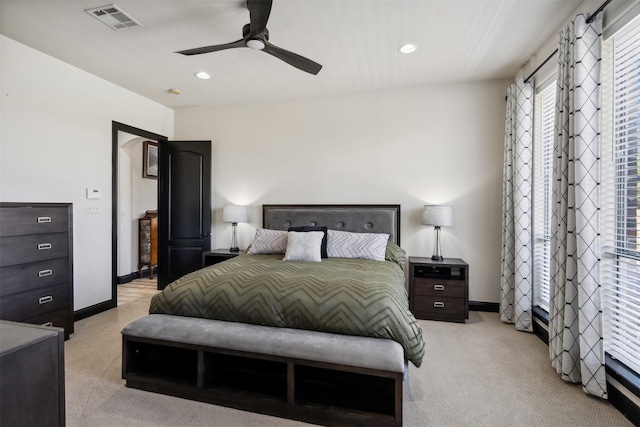 carpeted bedroom with ceiling fan