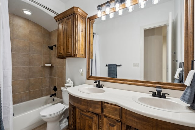 full bathroom featuring shower / bath combination with curtain, vanity, and toilet