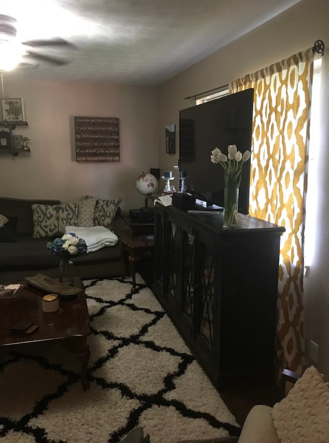 living room with ceiling fan