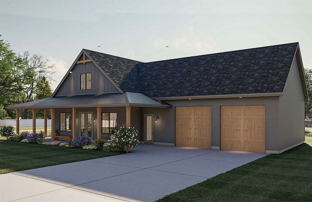 view of front facade with a porch, a front yard, and a garage