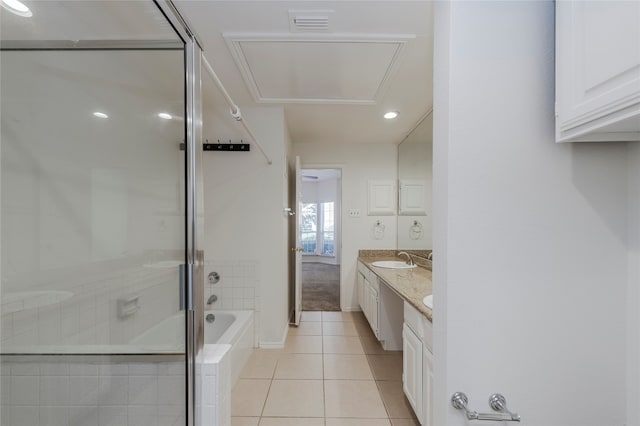 bathroom with vanity, tile patterned floors, and shower with separate bathtub