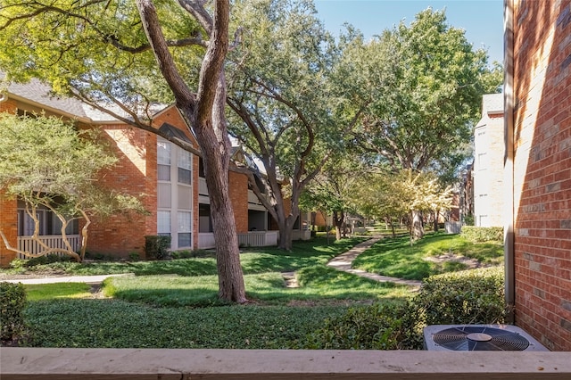 view of yard featuring central AC unit