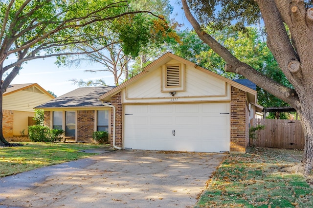 ranch-style home with a garage