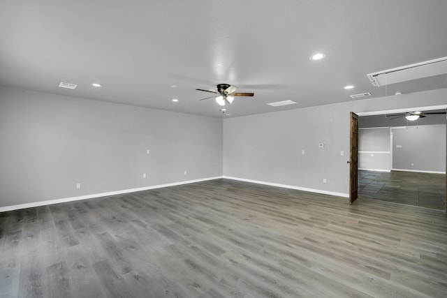 unfurnished room featuring dark hardwood / wood-style flooring