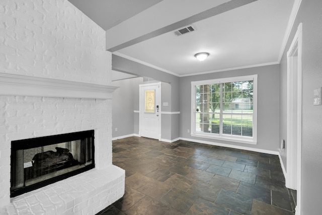 living room with crown molding and a brick fireplace