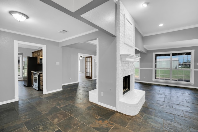 unfurnished living room with crown molding and a fireplace