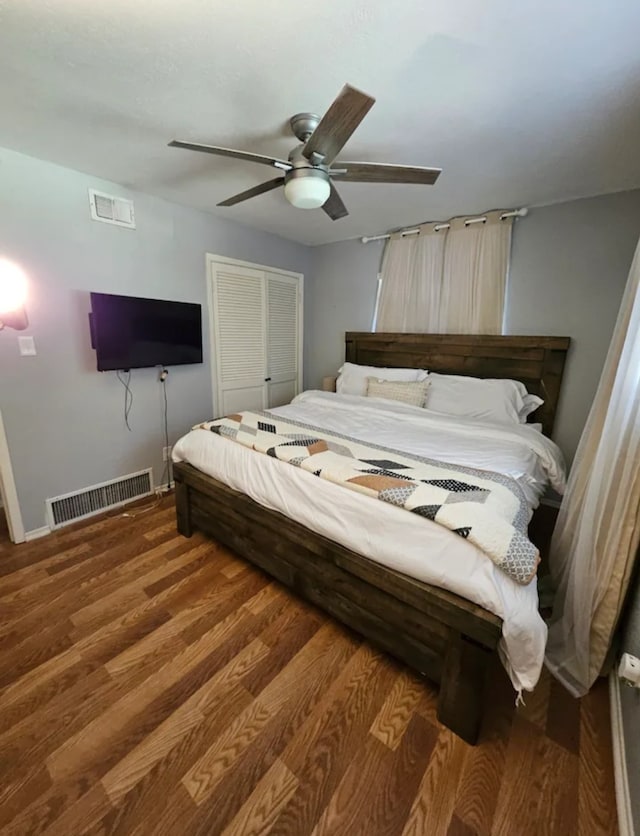 bedroom featuring a closet, ceiling fan, and wood-type flooring