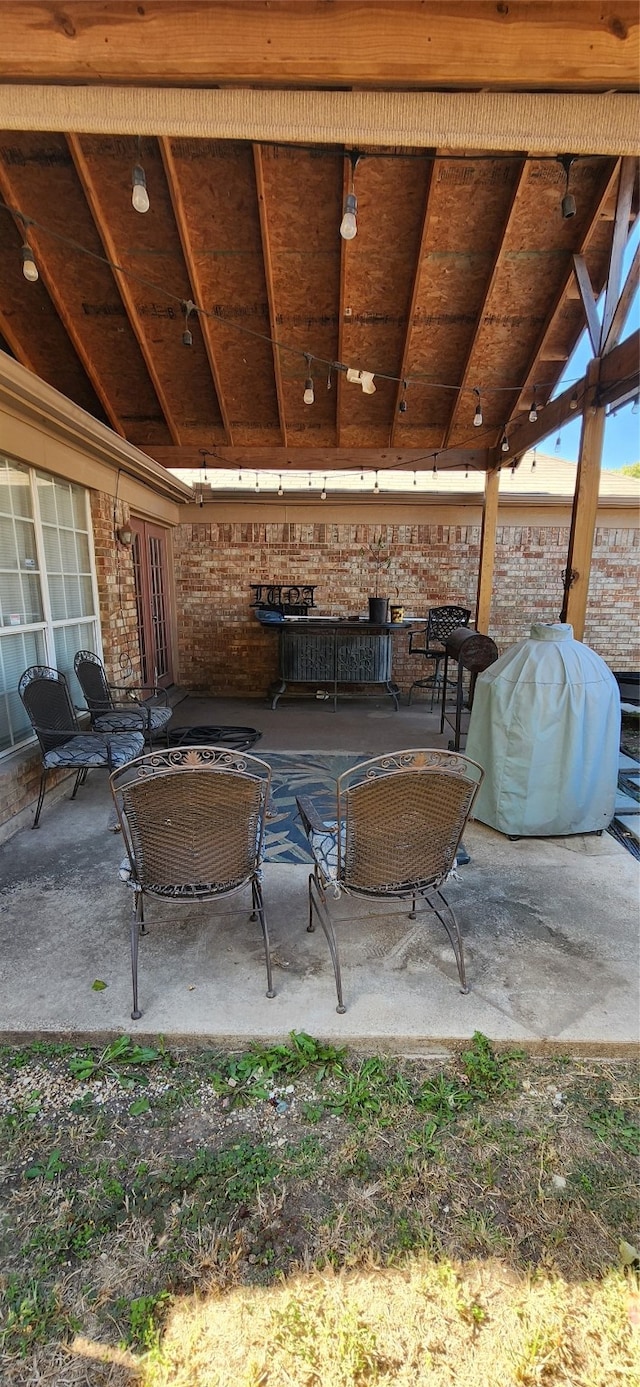 view of patio / terrace featuring a fire pit