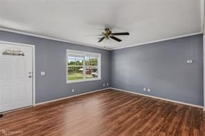 foyer featuring dark hardwood / wood-style floors and ceiling fan