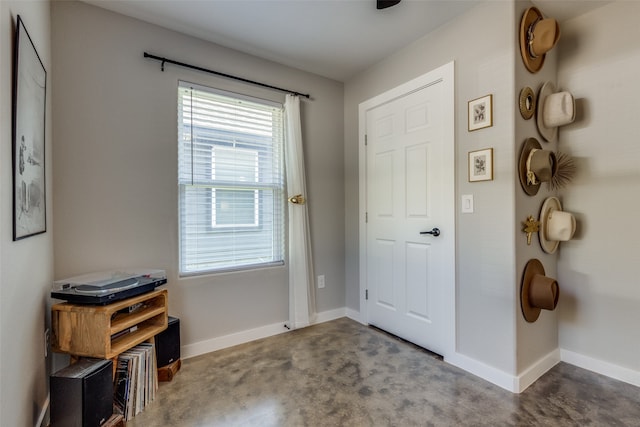 doorway to outside with carpet flooring