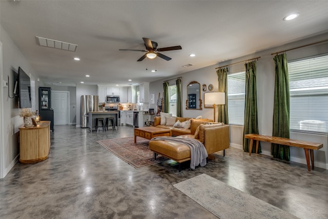 living room with ceiling fan