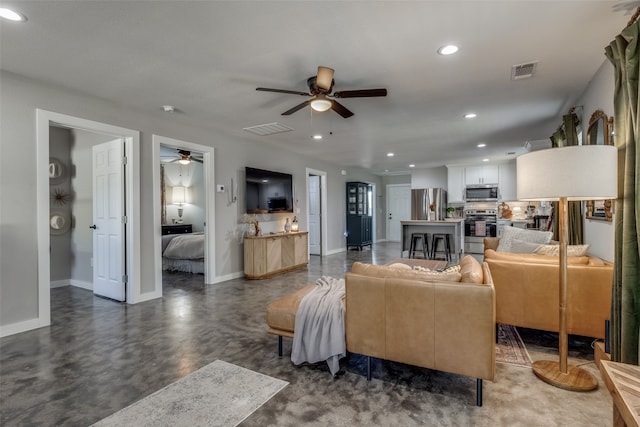 living room featuring ceiling fan