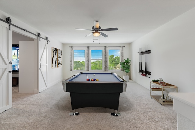 rec room featuring a barn door, a wealth of natural light, light colored carpet, and billiards