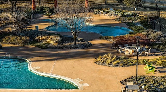 view of pool featuring a patio