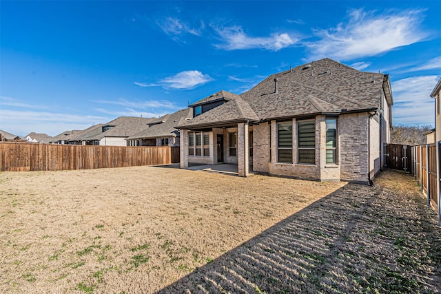 rear view of property with a patio