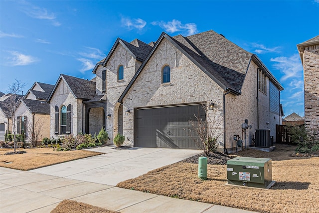 view of front of property with central AC unit