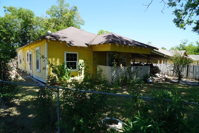 exterior space with a front lawn