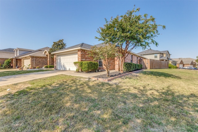 ranch-style home with a front lawn and a garage