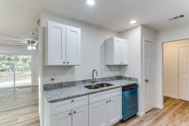 kitchen with sink, white cabinetry, dishwasher, and light stone counters