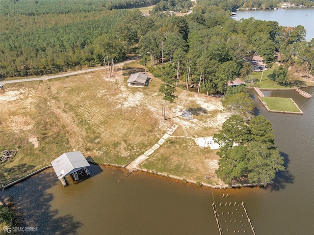 drone / aerial view with a water view