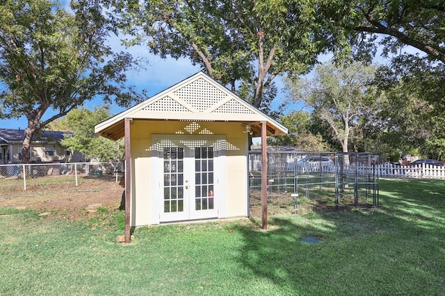 view of outdoor structure with a lawn