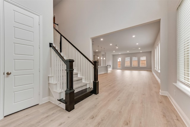 foyer with light hardwood / wood-style floors