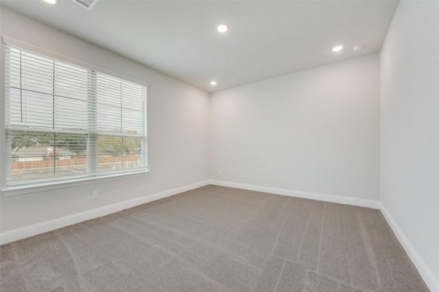 view of carpeted spare room