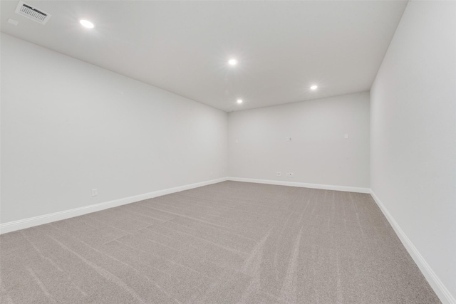 empty room with carpet flooring