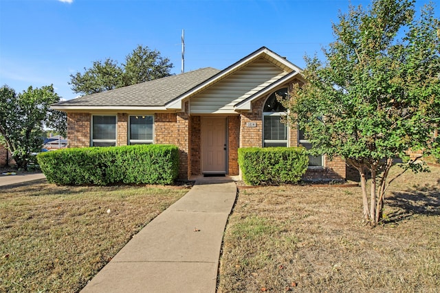 bungalow with a front lawn