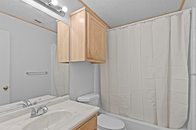 full bathroom with toilet, a textured ceiling, vanity, and shower / bathtub combination with curtain