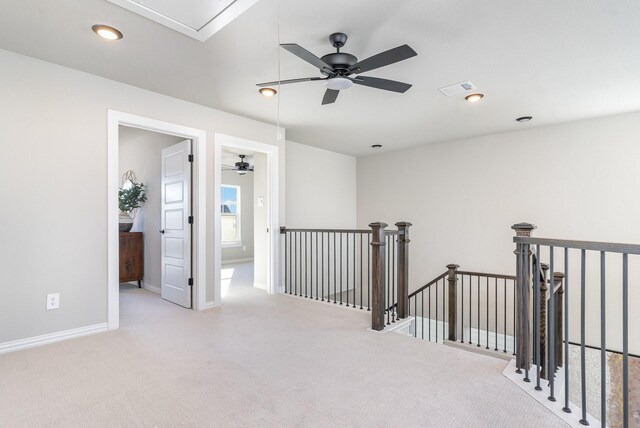 living room with a high ceiling and light hardwood / wood-style floors