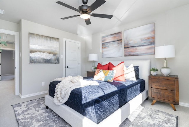 bedroom with ceiling fan and carpet