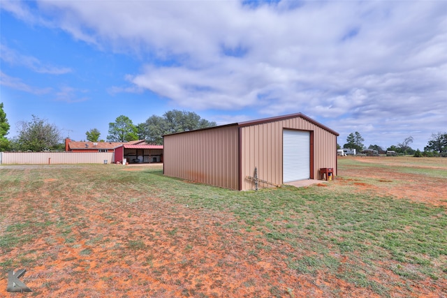 view of outdoor structure with a garage