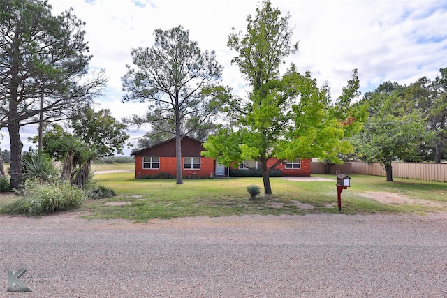 exterior space with a front yard