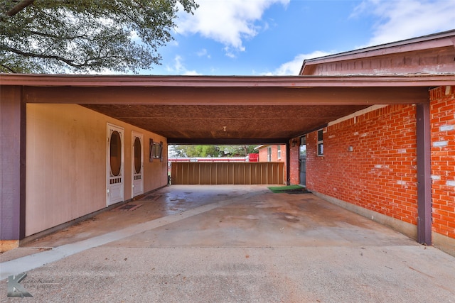 view of parking featuring a carport