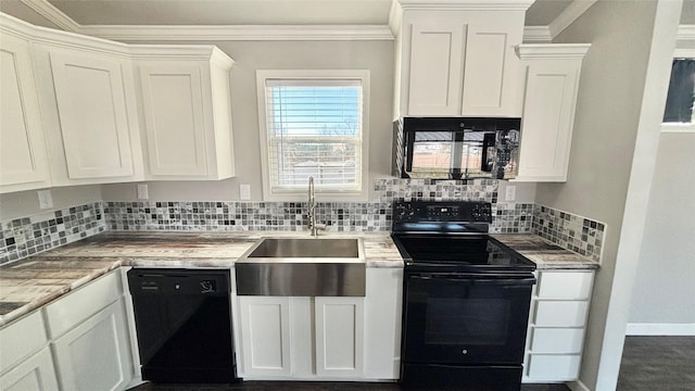 kitchen with white cabinetry and black appliances