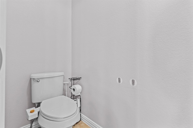 bathroom featuring toilet