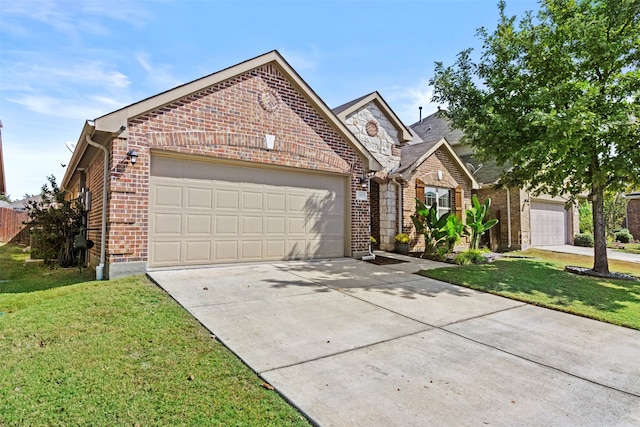 view of front of home with a garage and a front lawn