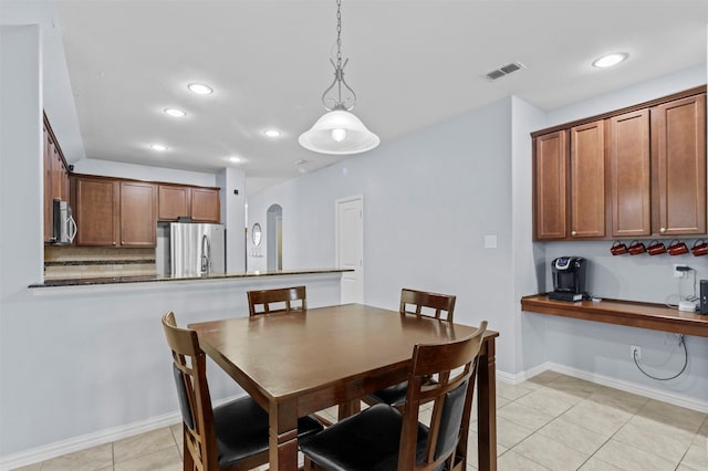 view of tiled dining area