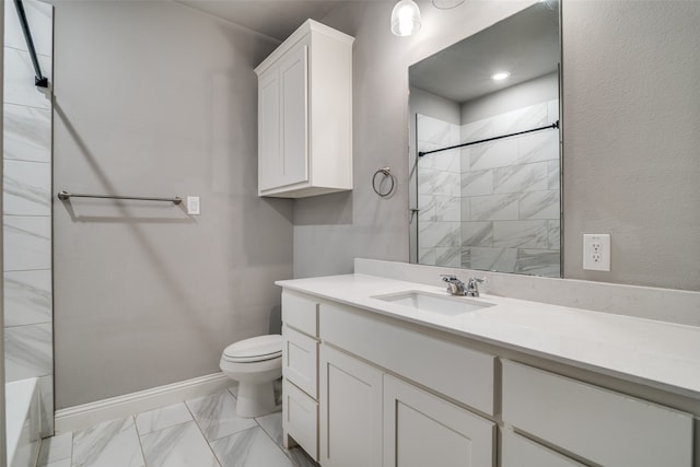 full bathroom with vanity, tiled shower / bath combo, and toilet