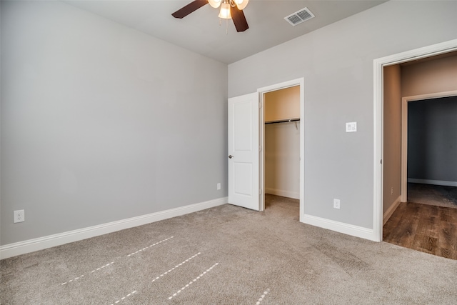 unfurnished bedroom with carpet flooring and ceiling fan