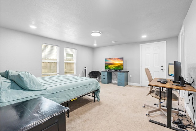 bedroom featuring baseboards, recessed lighting, a textured ceiling, and light colored carpet