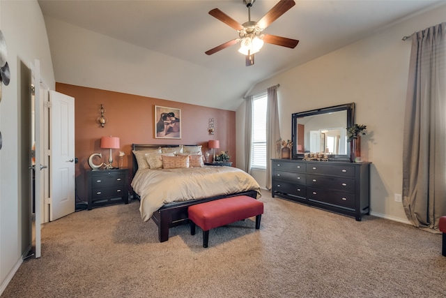 bedroom featuring vaulted ceiling, carpet floors, and ceiling fan