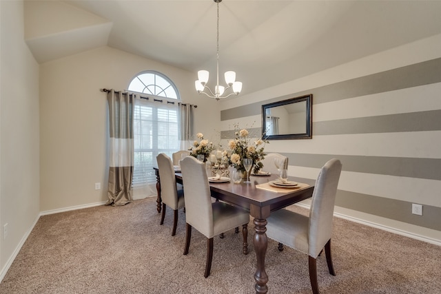 carpeted dining room with lofted ceiling and an inviting chandelier