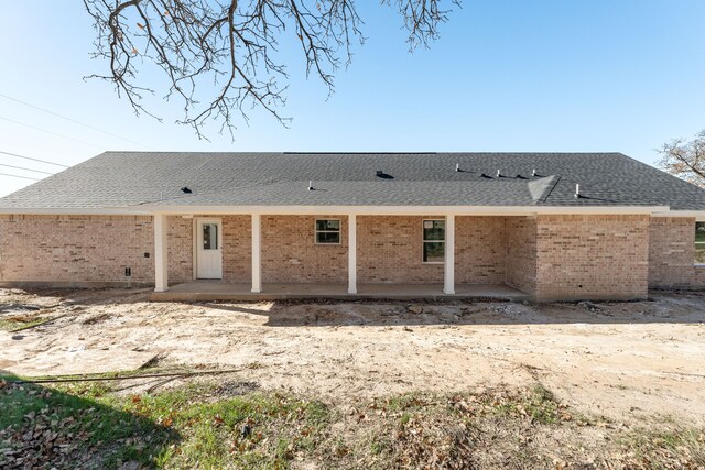 back of house featuring a patio