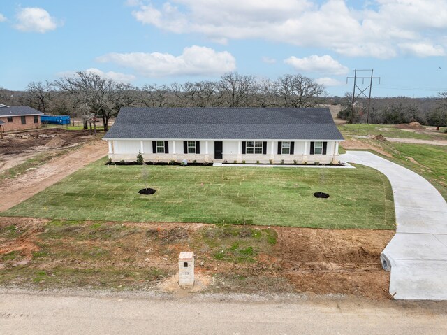 view of front of house featuring a garage and covered porch