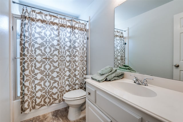 full bathroom featuring vanity, shower / bath combo, toilet, and tile patterned flooring