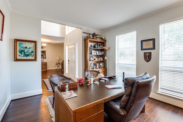 home office with a notable chandelier, ornamental molding, and dark hardwood / wood-style flooring