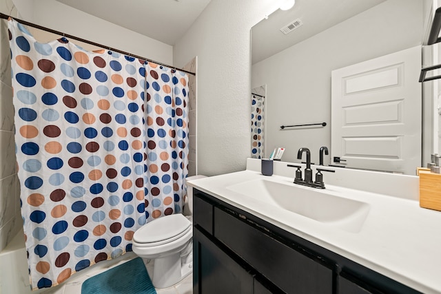 full bathroom with vanity, shower / bath combo with shower curtain, and toilet