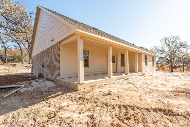 rear view of property with a patio